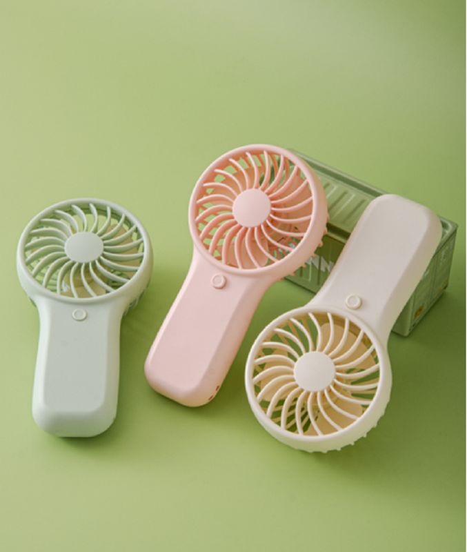 Ventilador portátil de mão com bateria AA, 2W de potência, 3V de voltagem, modo de velocidade única, inclui cordão, branco, verde, rosa